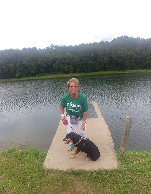 Bev Crandall-Rice with her dog, participating in a walk-a-thon to raise money for a Grand Rapids non-profit organization.
